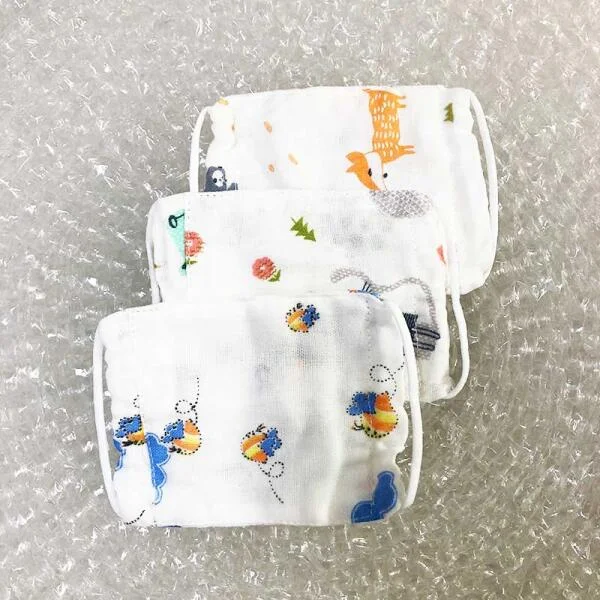 khau-trang-em-be-vai-xo-4-lop-1