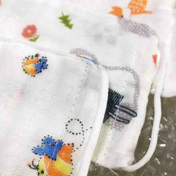 khau-trang-em-be-vai-xo-4-lop-3